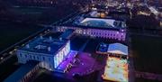 An ice rink on the Royal Museums Greenwich Grounds next to the Queen's House