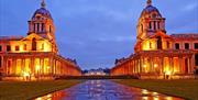 The University of Greenwich campus in a yellow light in the evening