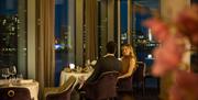 Kinaara, a stylish, fresh and fragrant contemporary Indian Fine Dining restaurant with views across the Canary Wharf Skyline and River Thames