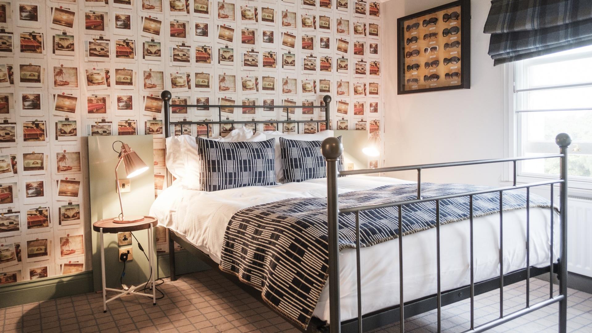 A large bed in a cosy boutique room at The Pilot on Greenwich Peninsula.