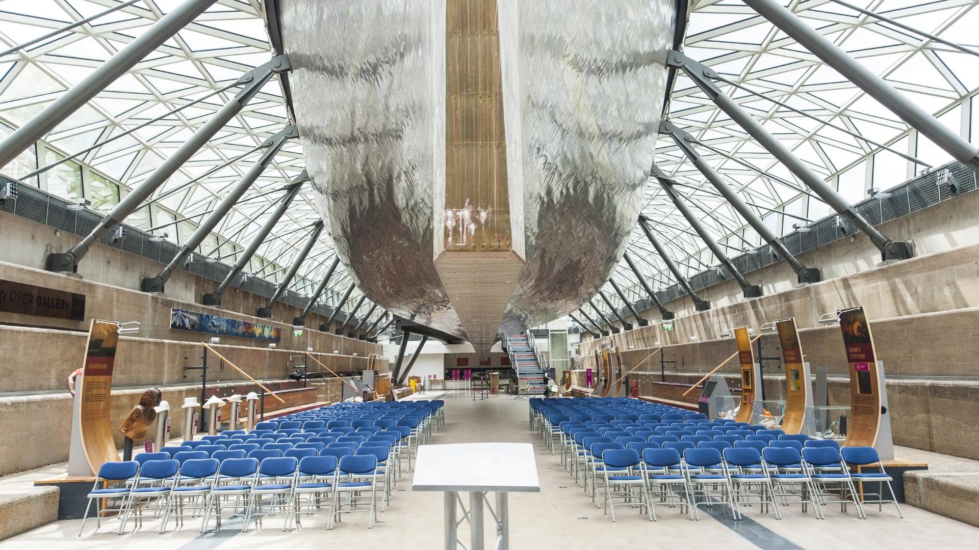 Theatre style seating is set up below the famous Cutty Sark ready for conferences, meetings and events.