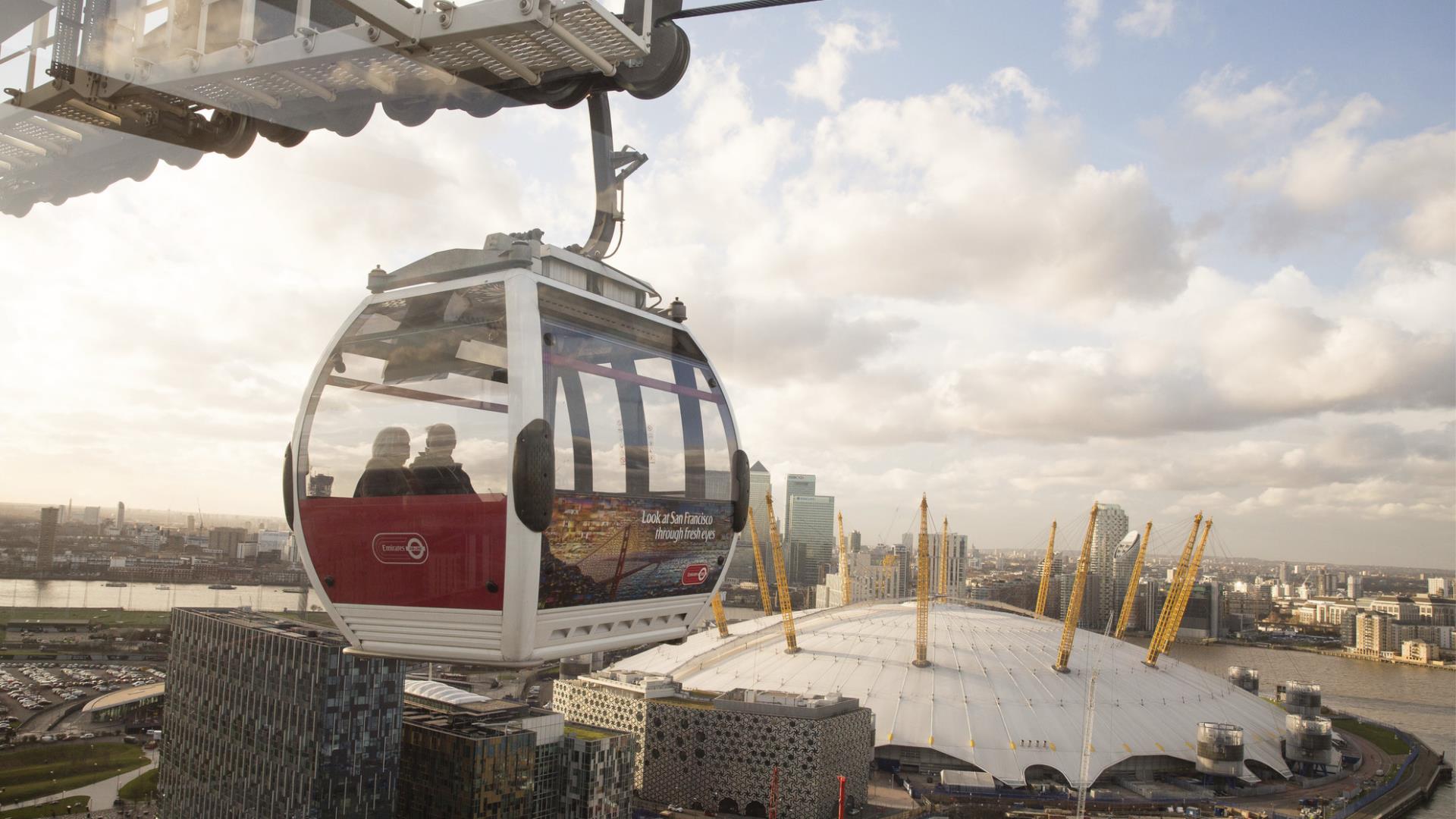 A view of from above of the Emirates Air Line cable car and The O2 on Greenwich Peninsula.