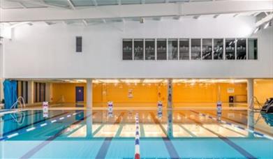Inside Thamesmere Leisure Centre, showing a bright blue swimming pool.