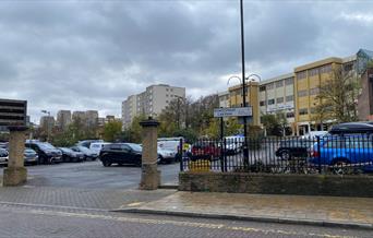 A picture taken of Powis street car park,showing multiple spaces for disabled and non disabled users.