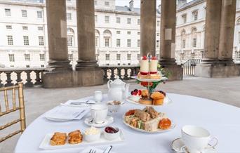 Indulge in the most sumptuous afternoon tea on the Colonnades.