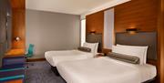 A comfortable, modern double twin room at Aloft London Excel in London's Docklands.