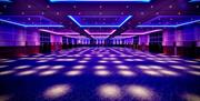 Arora Ballroom - A large carpeted space with blue lights

Large carpeted space with blue lights in the Arora Ballroom at InterContinental London – The