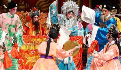 Discover and witness preparations, including applying the signature Chinese opera makeup, doing the hair, putting on the costumes, and find out about