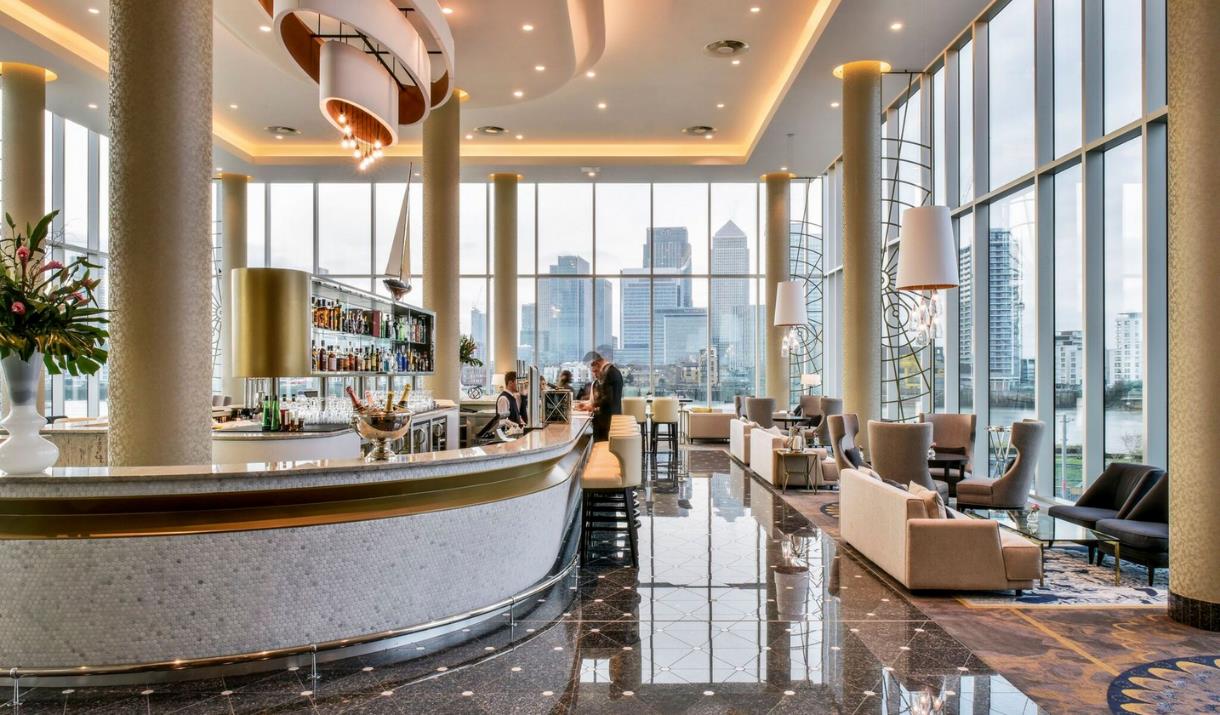 The Clipper Bar at the InterContinental London - The O2. With floor to ceiling windows that overlook the river Thames and Canary Wharf.