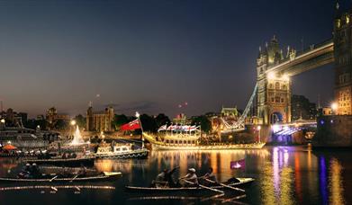 An illuminated flotilla of over a hundred and fifty boats, including Gloriana The Queen’s Rowbarge, will float down the River Thames