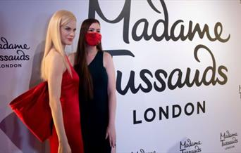 Enjoy a trip around London with the hop-on hop-off bus ticket for the Golden Tours open top bus with Madame Tussauds and Tower of London