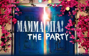 Mamma Mia! The Party entrance giving the feel of Greek island with blue wooden doors and pink flowers running across the wall