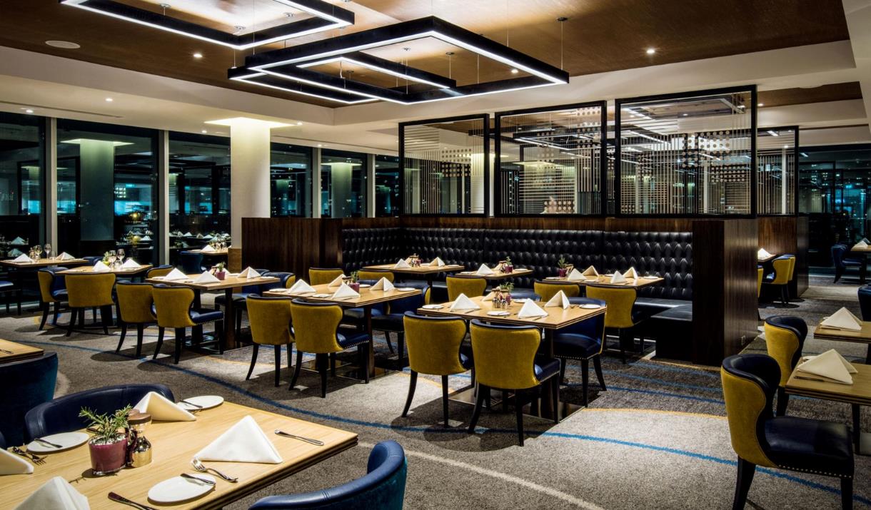 The luxurious interiors of the Market Brasserie at InterContinental London - The O2, overlooking Canary Wharf.