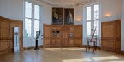 White pictured walls and wooden floor for reception at the Octagon Room in Flamsteed House, Royal Observatory