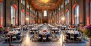 blue banqueting round tables setup in the Painted Hall for formal dinner