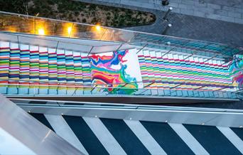 Come along and see the immersive river of colour that cascades down The Tide staircase in parallel stripes. It's definitely one for the 'gram!