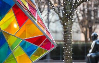 Summer Lights is a colourful exhibition celebrating natural light across the Canary Wharf estate.
