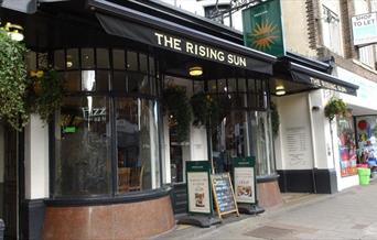 The Rising Sun, Eltham is a pleasant traditional pub on the High Street offering a good selection of reasonably priced pub food.