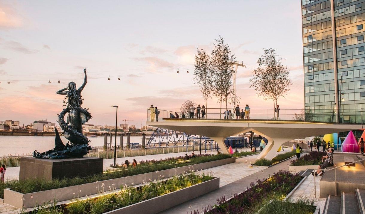 Overlooking The Tide elevated walkway and artist Damien Hirst art installation by river Thames.