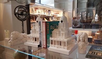 A range of incredible souvenirs situated across the Painted Hall gift shop
